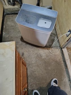 Little miniature washing machine really cool for cramped enclosed spaces  works excellent
