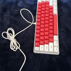 selling red and white keyboard taking offers