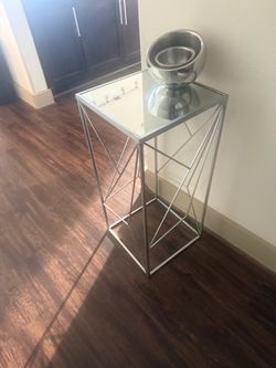 Two mirror tables