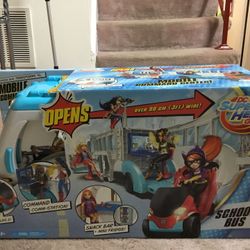 DC SuperHero Girls School Bus Vehicle Toy (the bus transforms into a mobile commander center, over 3 ft wide)