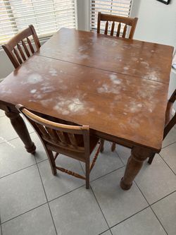 Solid oak dining table with 6 chairs
