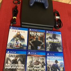 Play Station 4 PS4 Slim 1TB Comes With All The Wires Controller And 6 Cool Games Ready To Play