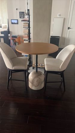 Counter height marble table and 2 CB2 chairs