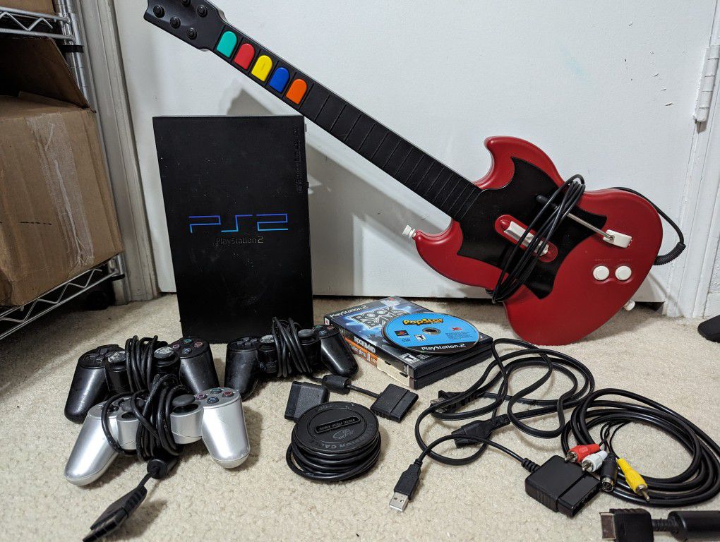 PS2 Gaming Bundle, 3 Controllers, Guitar, 7 Games