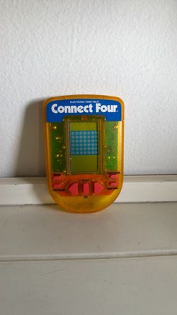 Connect four retro hand held game