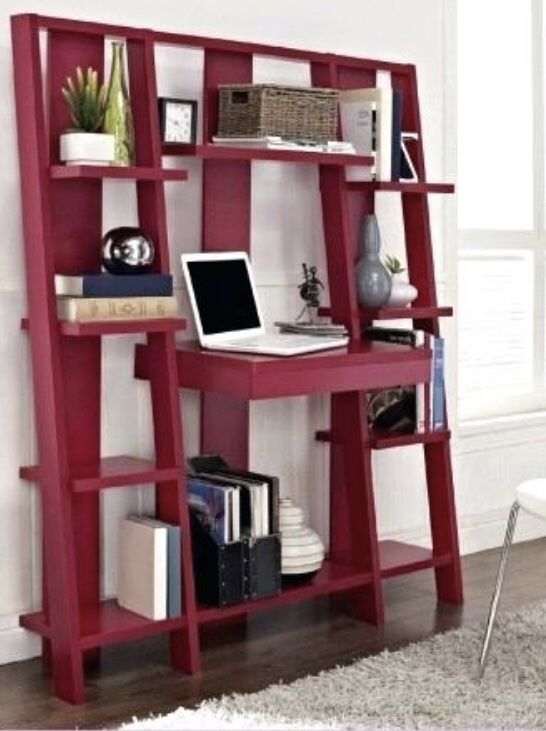 Red desk with ladder shelves