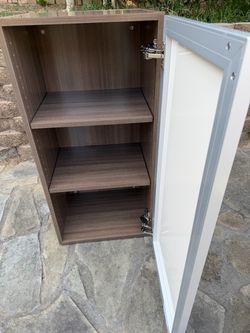 Modern Storage Cabinet with Frosted Glass Door – $150