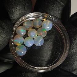Ten Small Ethiopian opal beads