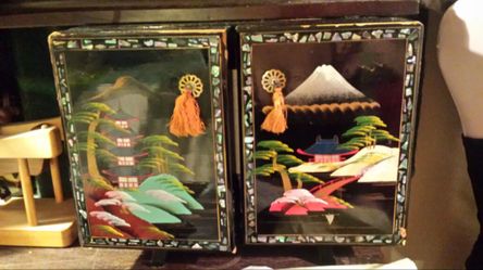 Jewelry box that opens up with drawers and mirrors it's an antique
