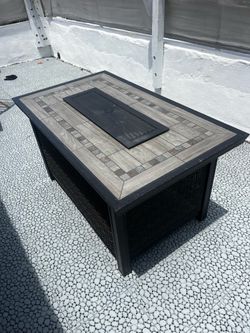 Outdoor fire pit table