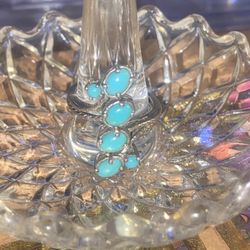 A vintage natural turquoise inlay sterling silver size 7 ring
