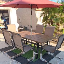 Patio Set All New Table And 6 Chairs With New Umbrela 