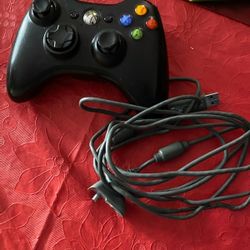 Xbox 360 With 6 Games and a Controller.