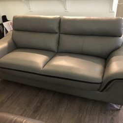 Two Grey Leather sofas For $770