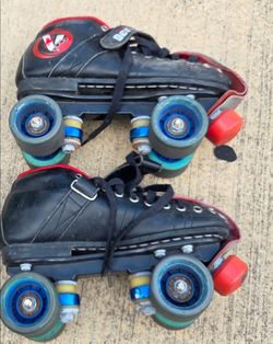 Two pair vanilla renegade Derby roller skates