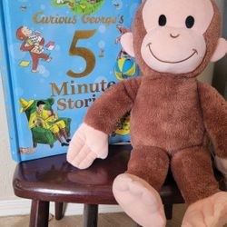 Curious George storybook and stuffed animal