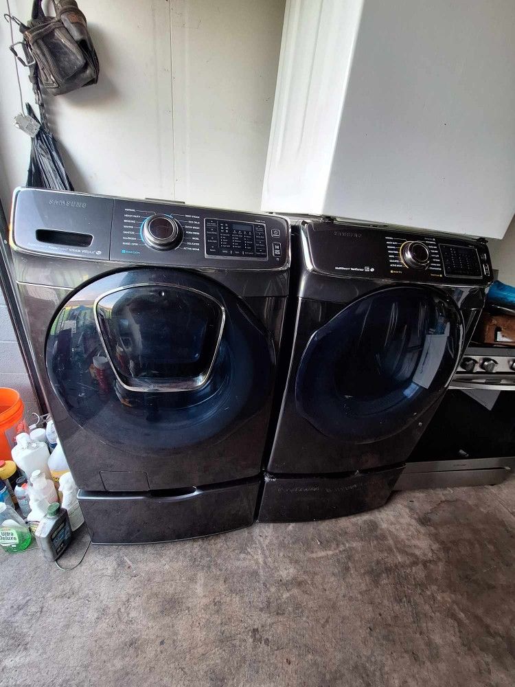 SAMSUNG STEAM FRONT LOAD WASHER WITH ADD ON DOOR AND GAS DRYER WITH PEDESTAL INCLUDED 