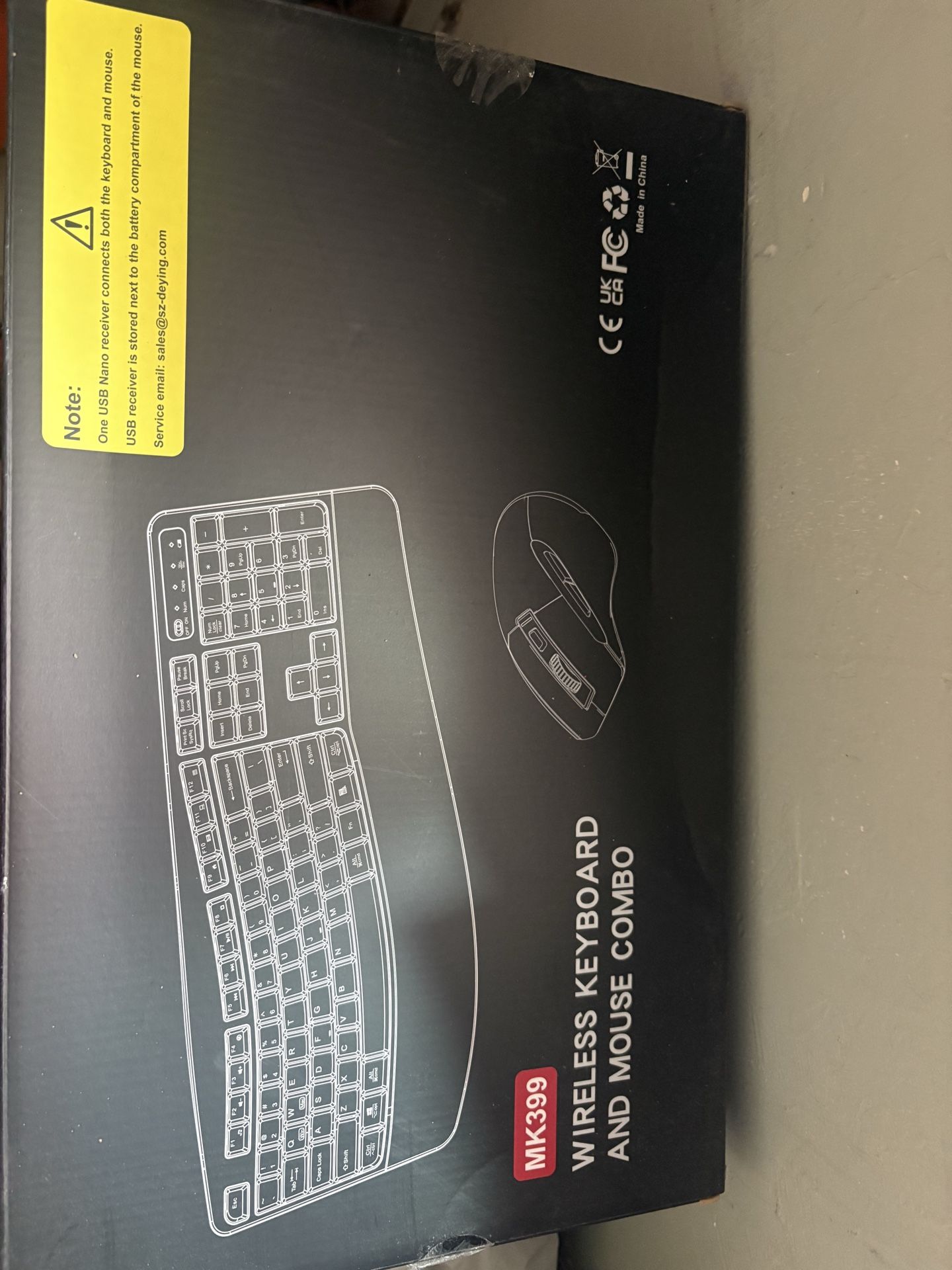Black wireless keyboard and mouse combo