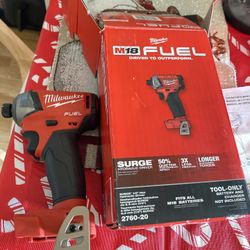 Drill Milwaukee with charger and batteries