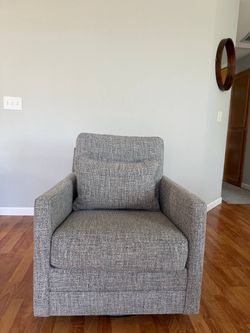 Ashley Gray Upholstered Swivel Accent Chair