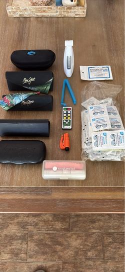 New Maui Jim sunglass CASES  and cleaners and miscellaneous items