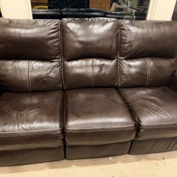 Matching brown leather couches. One recliner and one loveseat