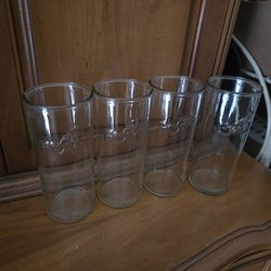 4 tall drinking glasses and potty seat