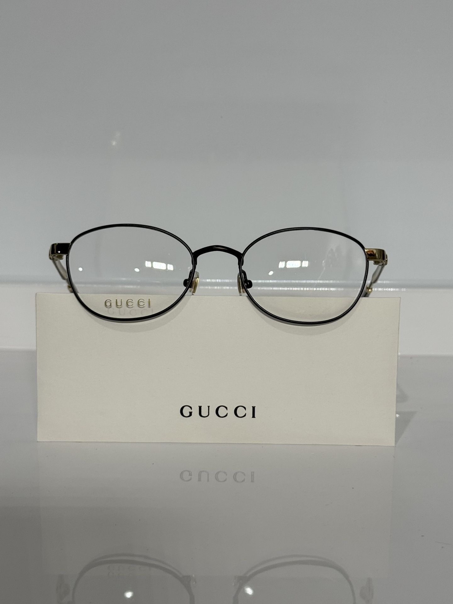 Gucci GG0591OJ 004 Black/gold Titanium Metal Eyeglasses 50mm