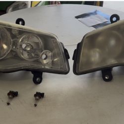 2014 Chrysler Town and Country headlights set, light bulbs included.