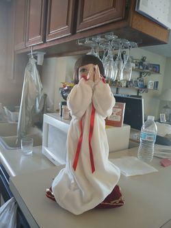 praying doll paradise galleries