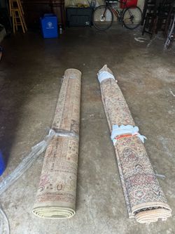 Two Rolled Oriental-Style Area Rugs, Dark wood coffee table with drawers & cane shelf (Comes as a set)