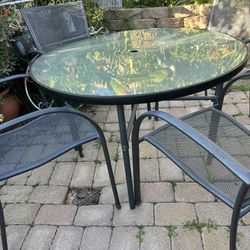 Patio Furniture Table Set!  Chairs Are Stackable For Easy Storage . 