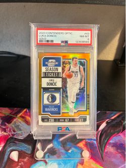 Luka Doncic Gold Optic /10 Jersey # PSA