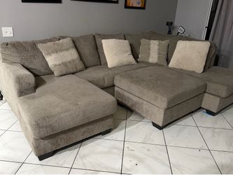 Sectional couches with ottoman