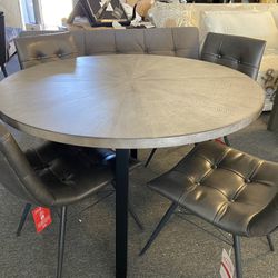 Modern Round Grey Solid Table Great Strong Chairs Better In Person. Was $1299. Now $599 Delivered 