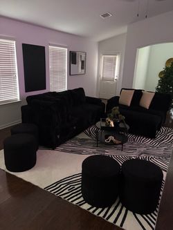 Living room set/wall pics/rug/coffee table/ottaman