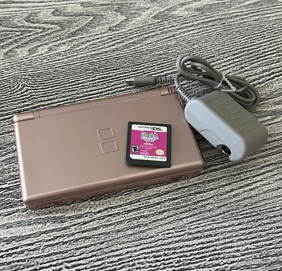 Metallic/Rose Gold Nintendo DS with a game, complete with a stylus & charger- Low Price. $30