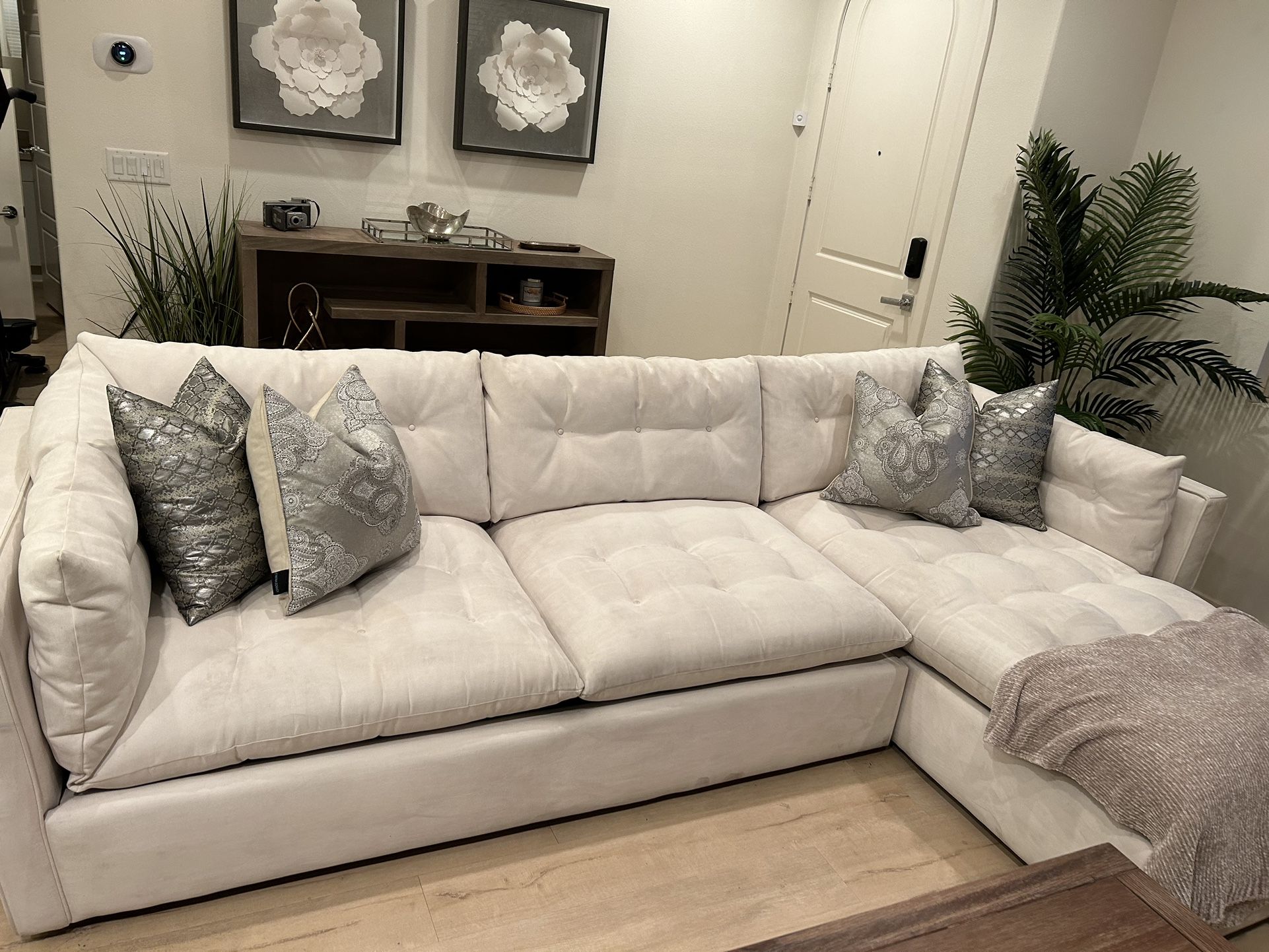 White modern sofa/couch made from an Alcatera-like fabric. Easy to clean and in great condition. Demensions: L 125” x 72” $650 obo. Located in