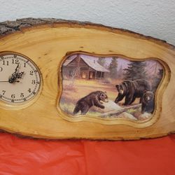 Vintage working wood clock with bears on it
