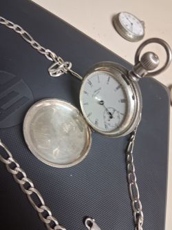 Silver watch and necklace