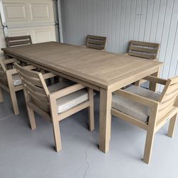 Outdoor patio teak wood table and 8 chairs