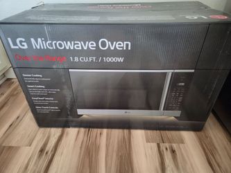 Unopened box  brand new microwave oven