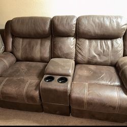 Brown sectional couches