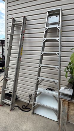 Two aluminum ladders