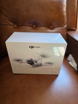 Unopened Dji mini 4k Combo (extra battery)