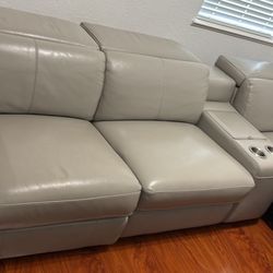 Eldorado furniture, leather couch all three seats recline