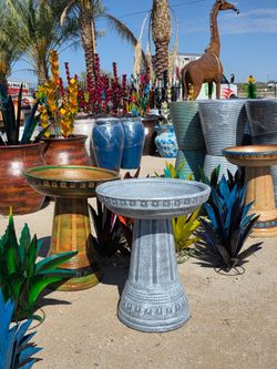 colorful birdbaths, and unique metal art imports. 🌵