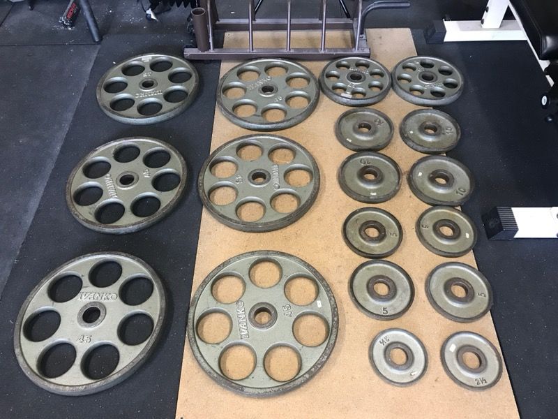 Rare steel Ivanko revolver olympic plates 385lb set + plate rack