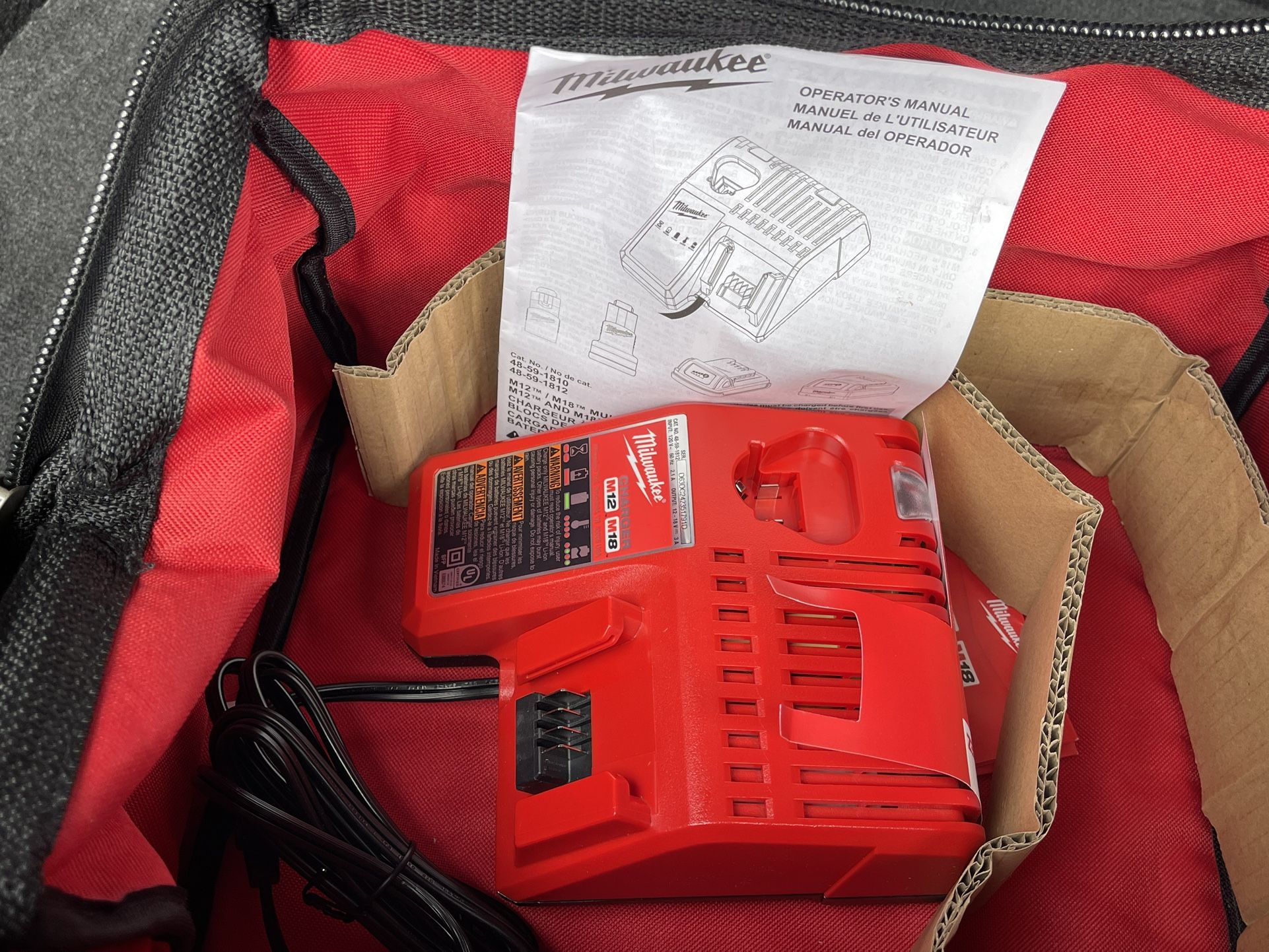 Brand New Milwaukee CHARGER and BAG