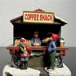 miniature christmas composition depicting a coffee shop